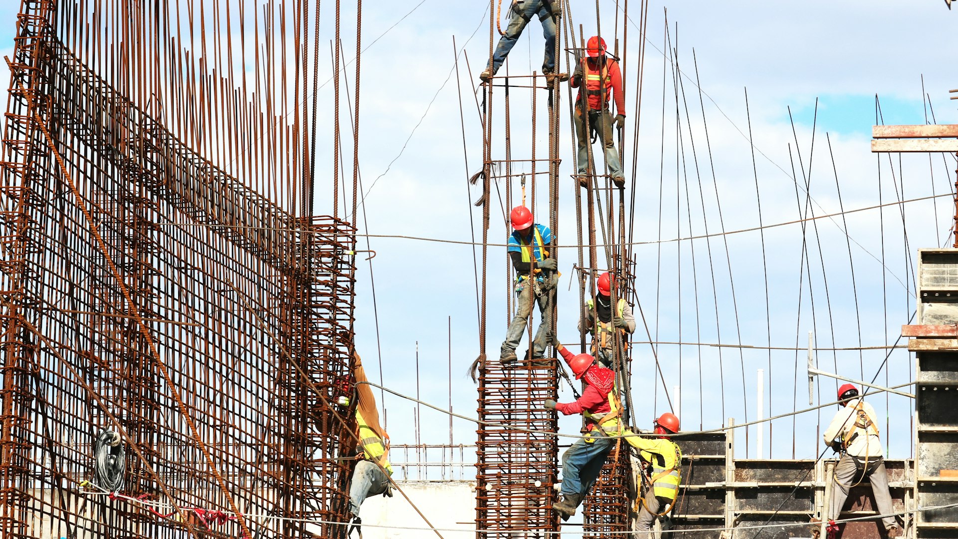 Construction site with modern machinery and data monitoring